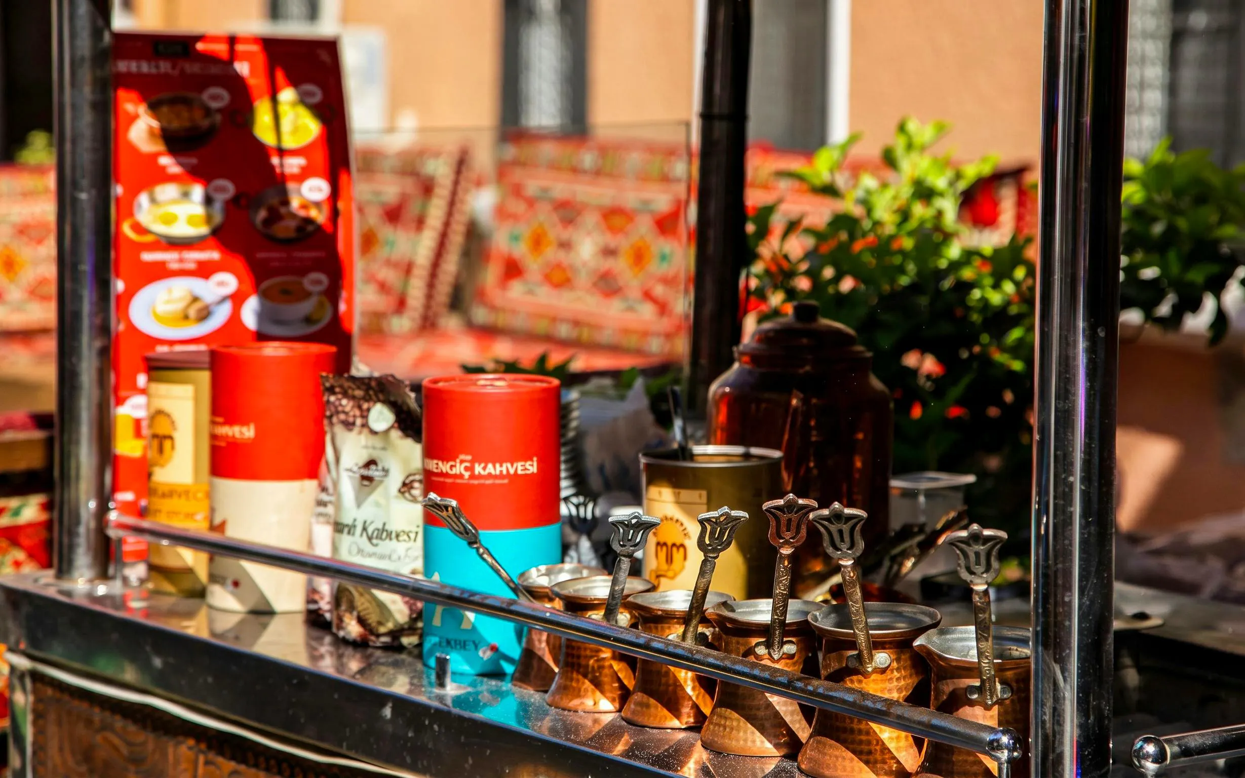 Turkish coffee pots and ingredients on display during Istanbul food tour.