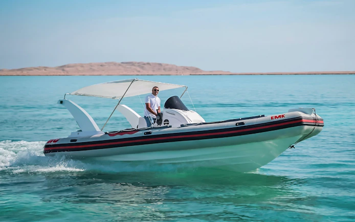 Private speedboat cruising near Orange Bay, Giftun Island, Hurghada.
