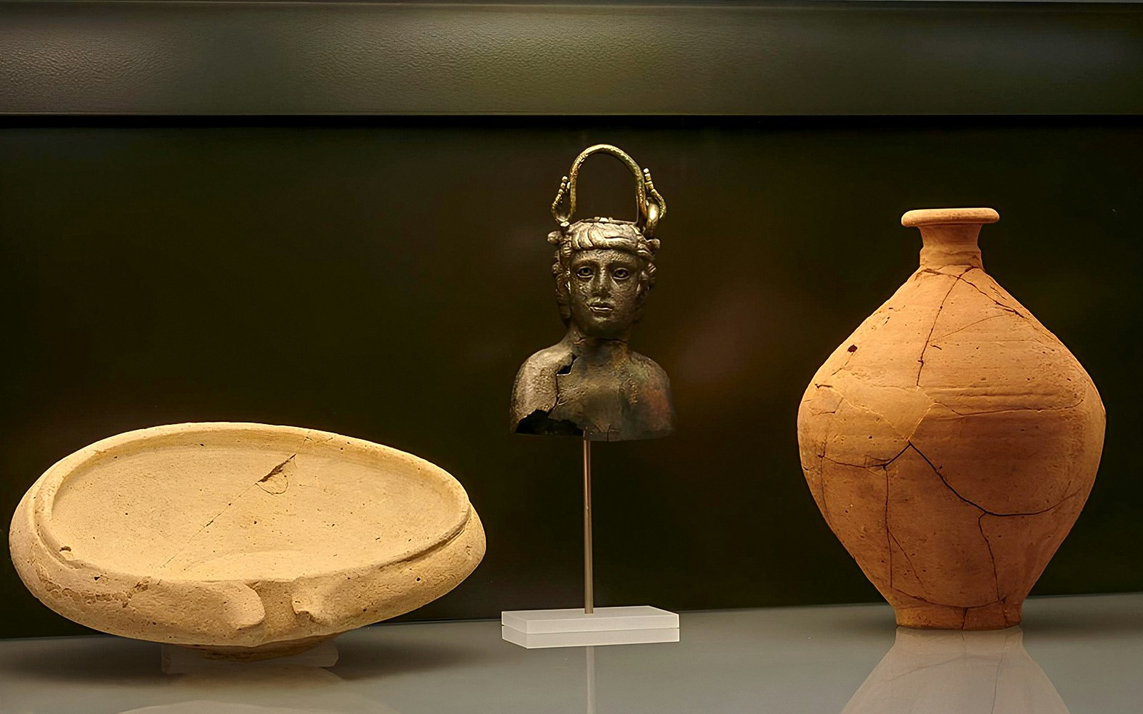 Ancient artifacts display at Carnavalet Museum exhibition.
