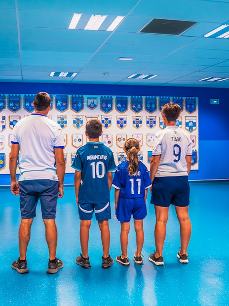 Family viewing memorabilia at Orange Vélodrome during OM Stadium Tour.