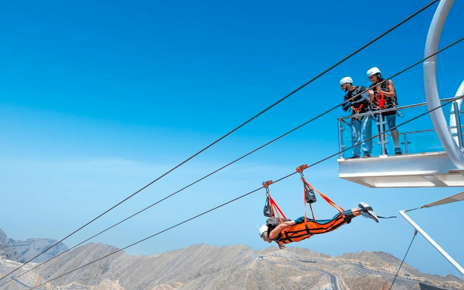 People watching a person experiencing the Jais Flight in the Jebel Jais mountains