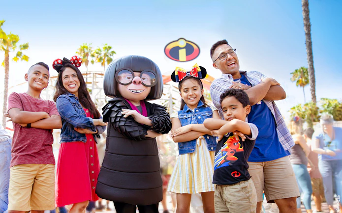 Guests posing with Edna from Incredibles at Disneyland Adventure Park, California.