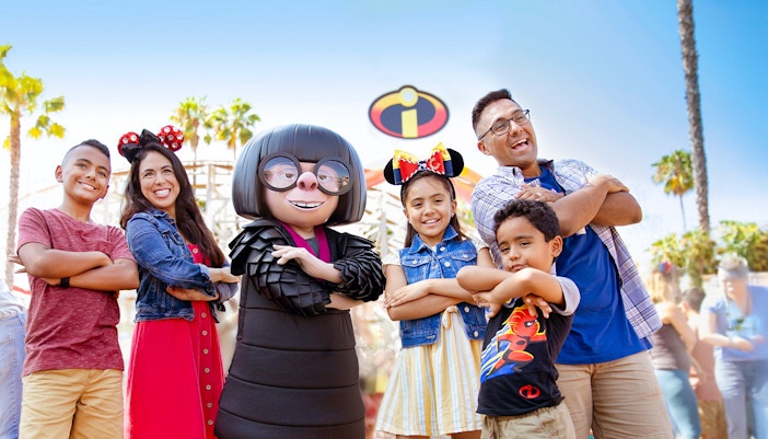 Guests posing with Edna from Incredibles at Disneyland Adventure Park, California.