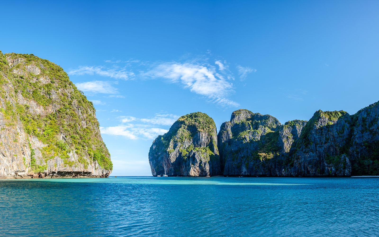 Limestone cliffs of Phi Phi Leh island in the turquoise Andaman Sea.