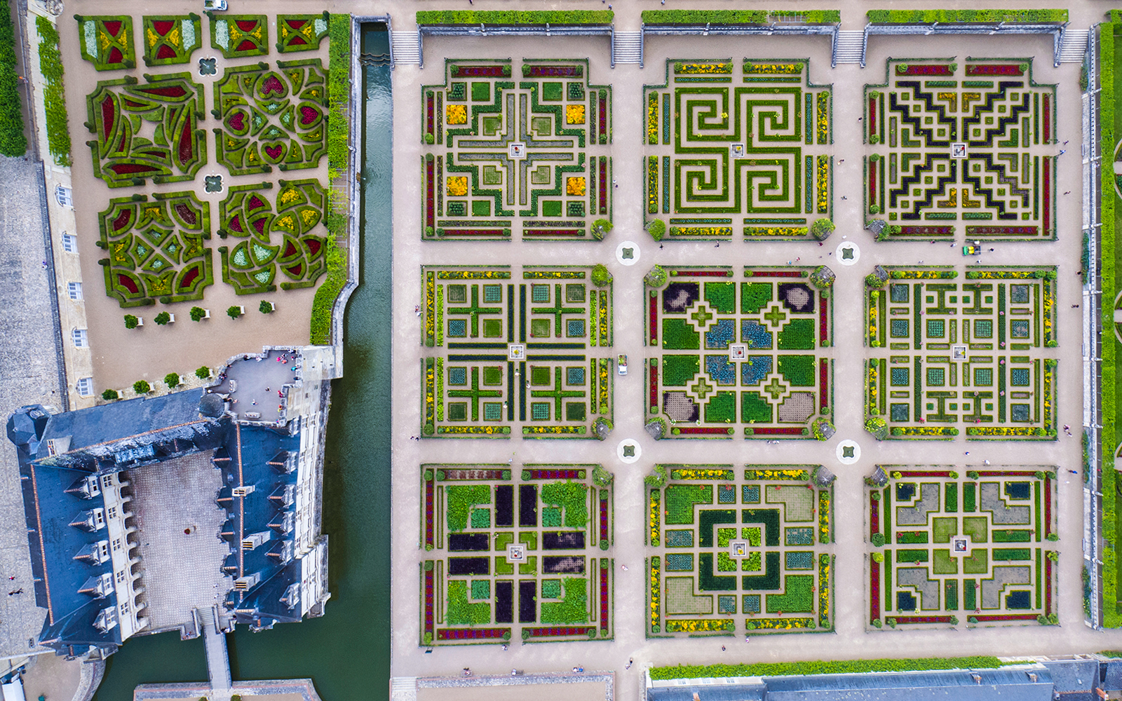 Aerial view of Château of Villandry Gardens' intricate geometric patterns in France.