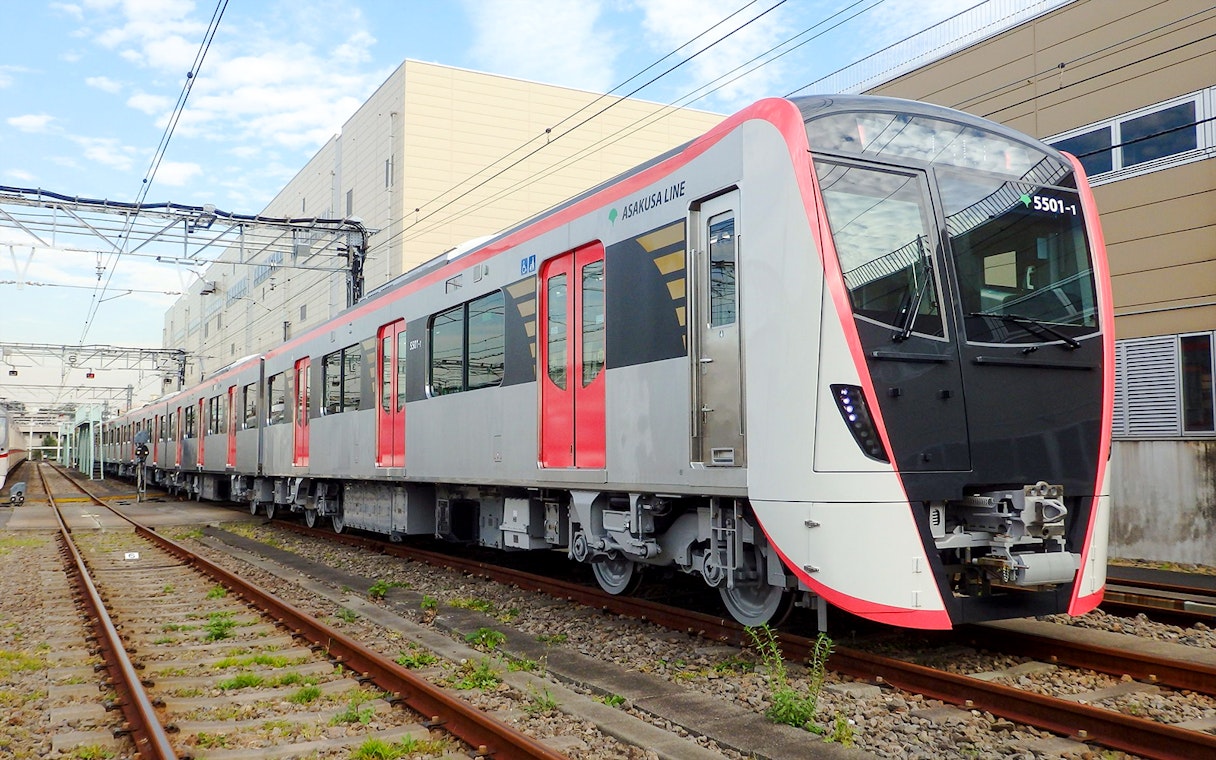 Tokyo Metro train on tracks, part of Toei Subway 24-hour unlimited rides.