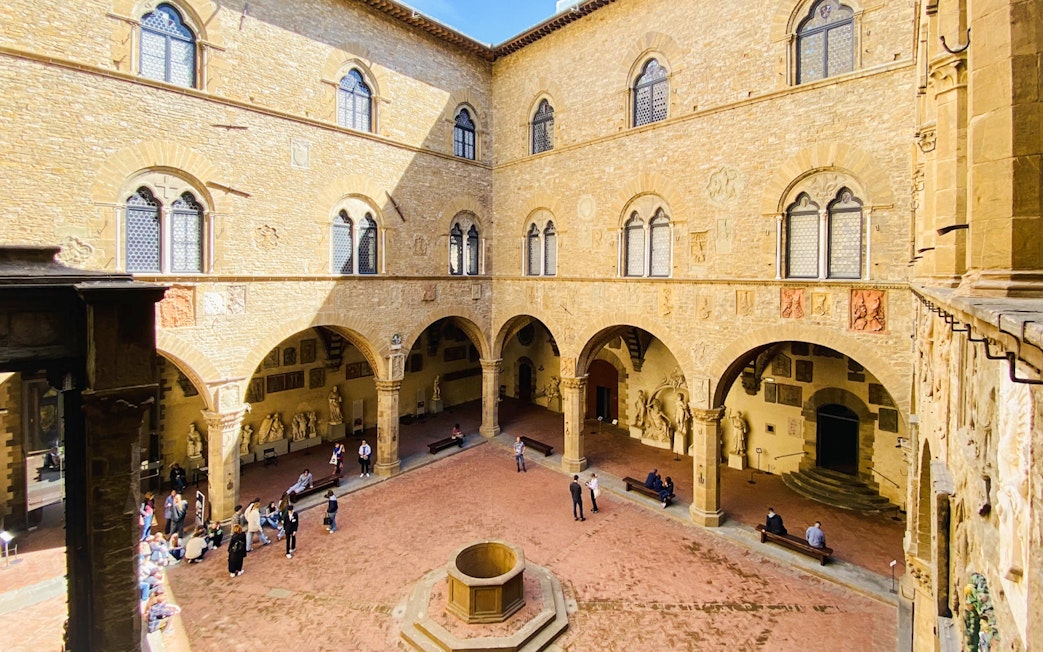 Bargello Museum courtyard with visitors, Florence guided tour.