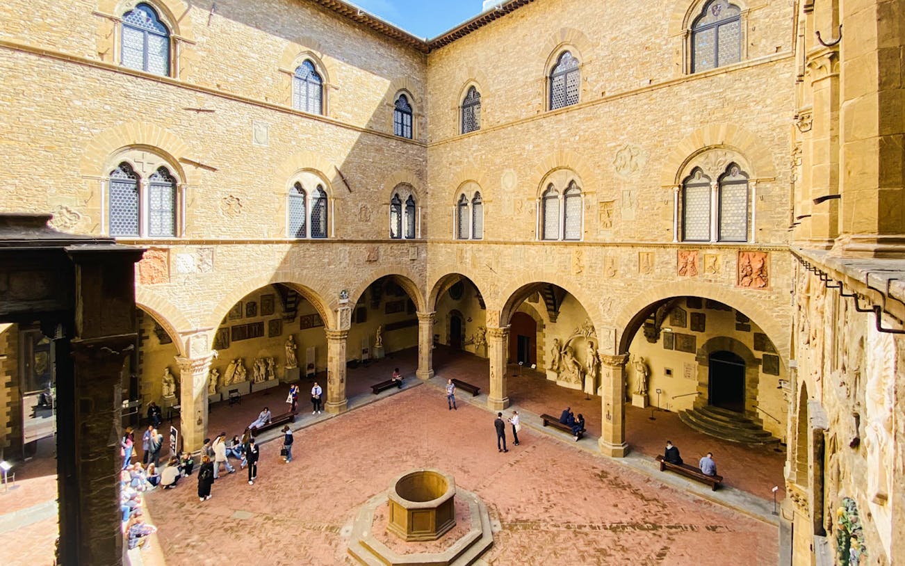Bargello Museum courtyard with visitors, Florence guided tour.