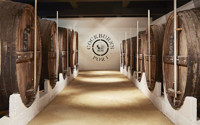 Wine barrels in a cellar at Cockburn's Port, Portugal.