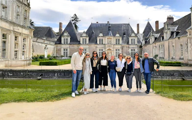 Tourists standing in front of Château de Chambord, France.