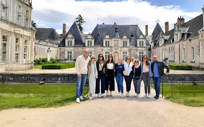 Tourists standing in front of Château de Chambord, France.