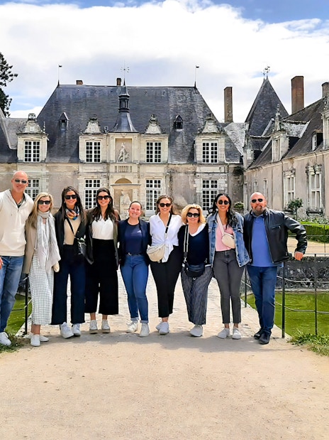Tourists standing in front of Château de Chambord, France.