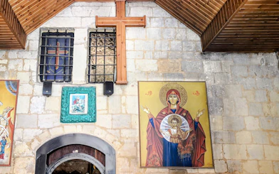 Religious artwork and cross inside a historic building on the As-Salt Harmony Trail, Amman.