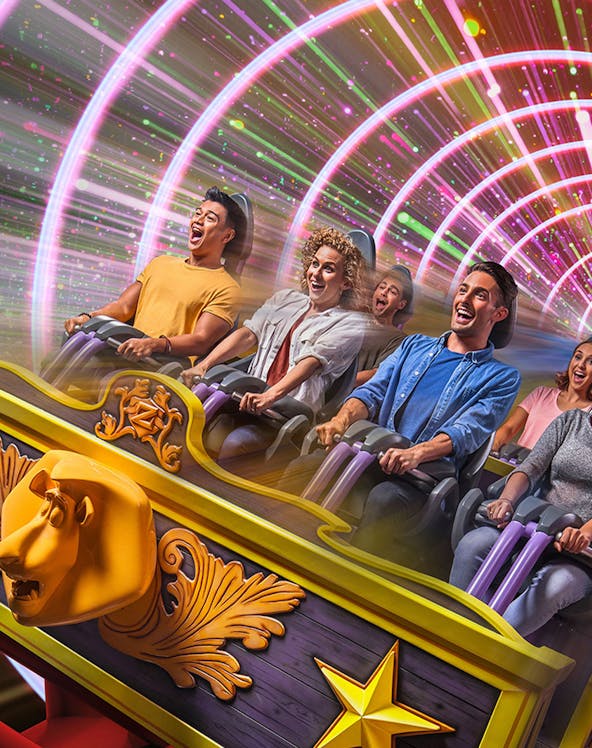 Visitors enjoying a roller coaster ride at Dubai Parks and Resorts, Dubai.