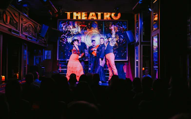 Flamenco dancers performing on stage at Teatro Flamenco Málaga Club.