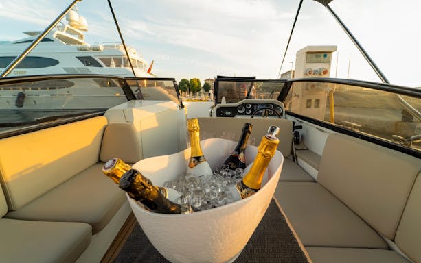 Champagne bottles in ice bucket on cruise deck, Zadar, Croatia.