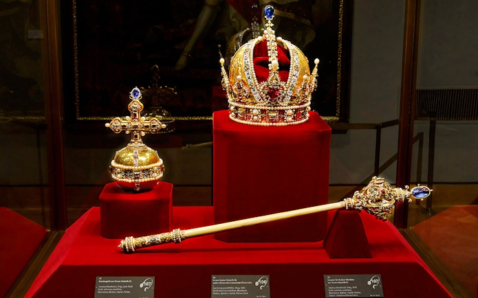 Imperial crown, orb, and scepter displayed at the Imperial Treasury in Vienna.