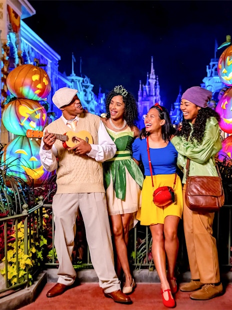 Guests in costumes enjoying Mickey's Not-So-Scary Halloween Party at Walt Disney Resort, Orlando.