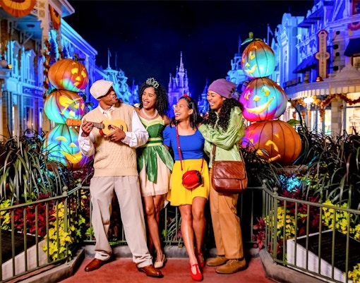 Guests in costumes enjoying Mickey's Not-So-Scary Halloween Party at Walt Disney Resort, Orlando.