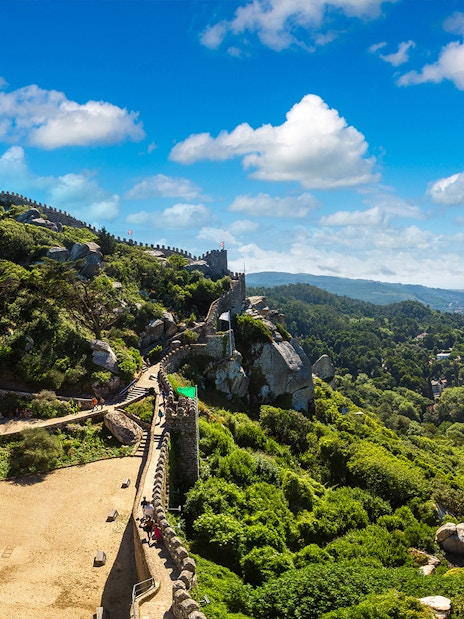 Former stables in Moorish Castle, Sintra, with scenic hilltop views.