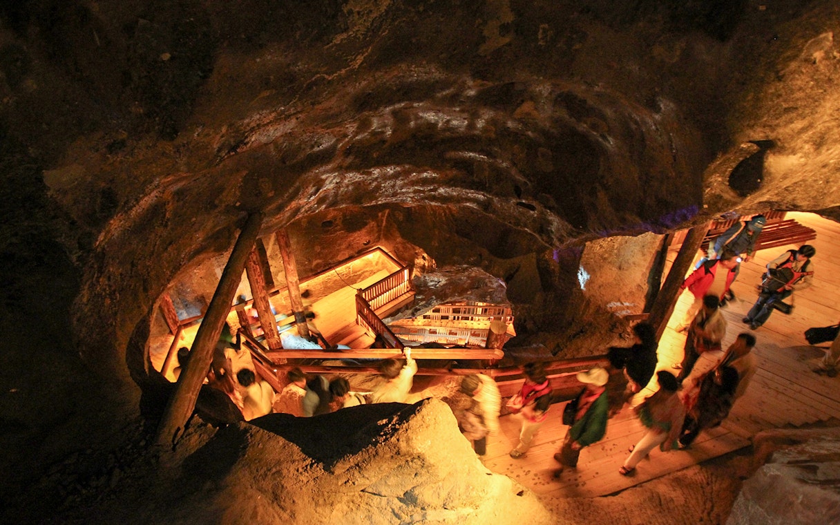 Visitors exploring underground tunnels at Wieliczka Salt Mine, Poland.