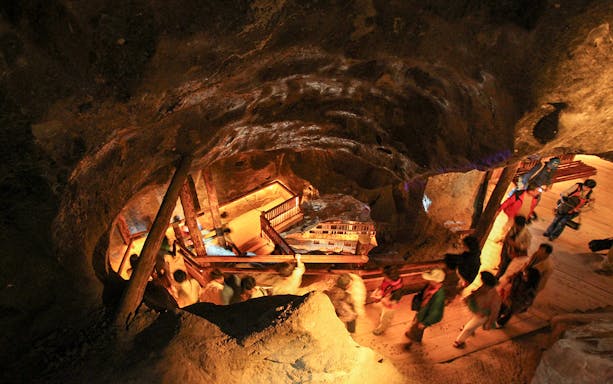 Visitors exploring underground tunnels at Wieliczka Salt Mine, Poland.