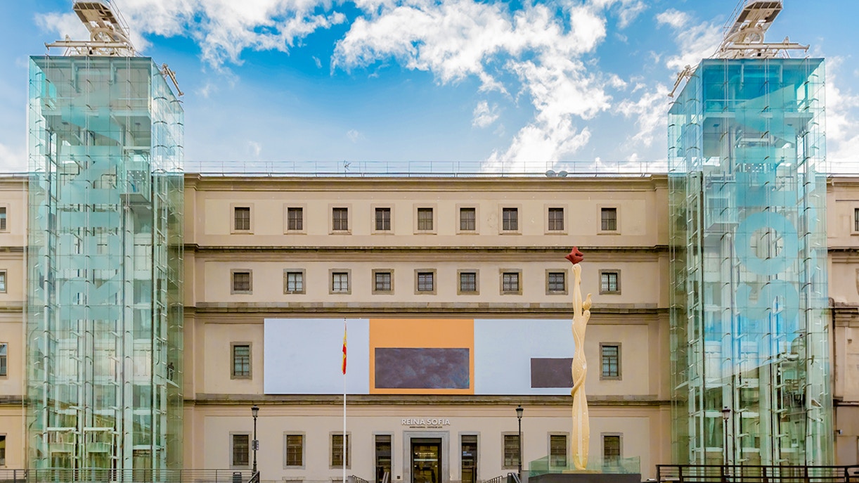 Reina Sofia Museum exterior in Madrid, Spain, with modern glass towers.