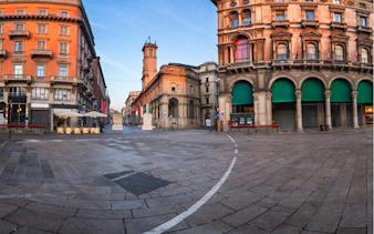 Historic buildings in Milan's city center, part of the self-guided exploration game.
