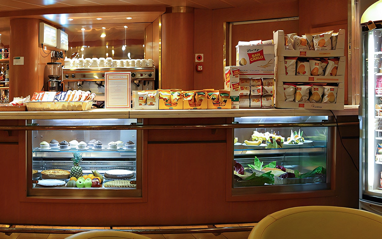 Ferry snack bar with pastries and fruit on display, SNAV Naples to Capri route.
