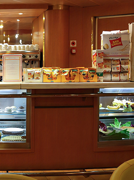 Ferry snack bar with pastries and fruit on display, SNAV Naples to Capri route.
