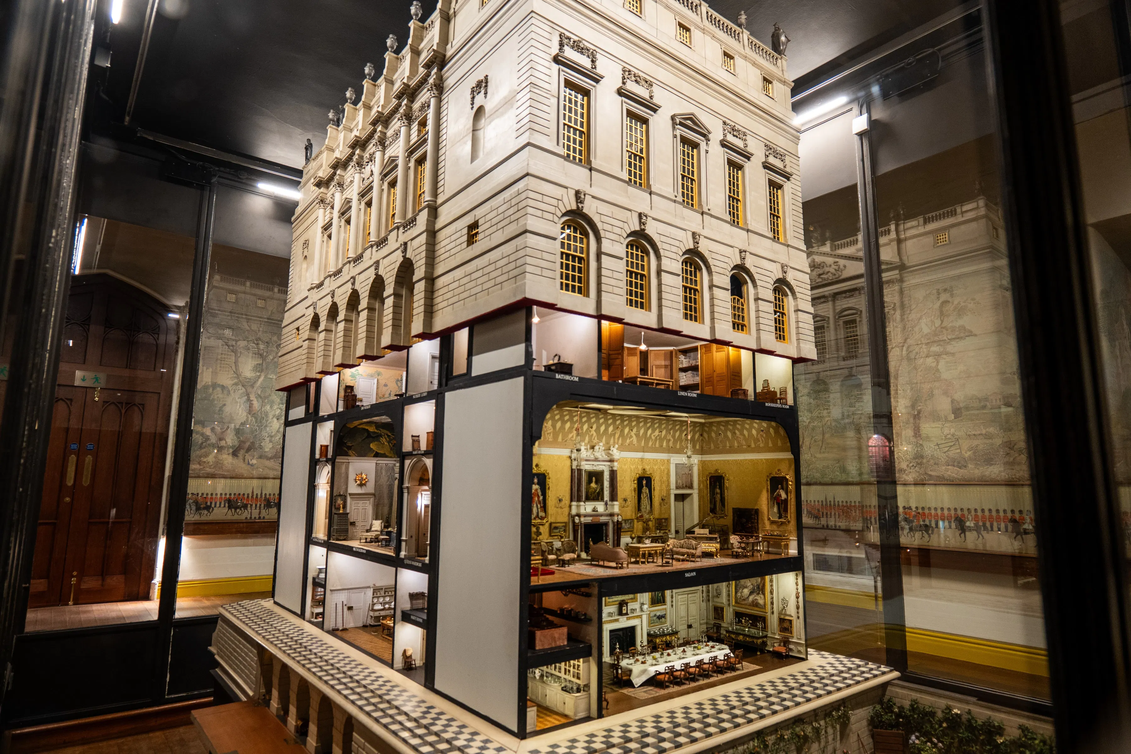 Queen Mary's Doll's House at Windsor Castle, showcasing intricate miniature furnishings.