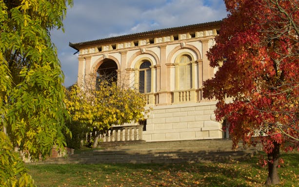 Villa dei Vescovi facade with autumn trees in Luvigliano, Italy.