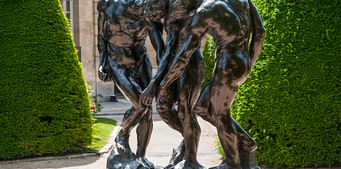 Rodin Museum sculpture exhibition featuring "The Three Shades" in Paris garden.