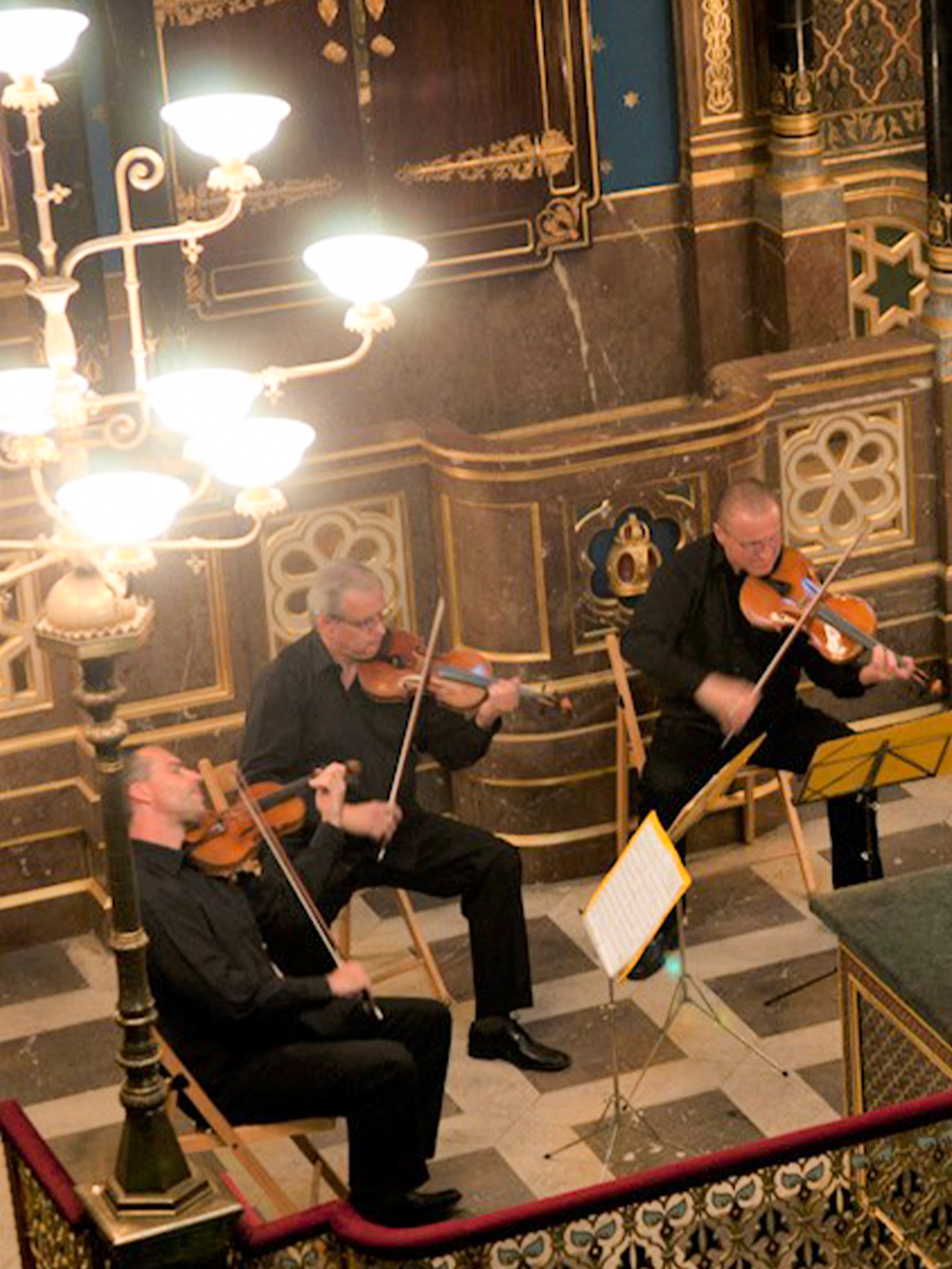 Musicians performing at a classical concert in the Spanish Synagogue.
