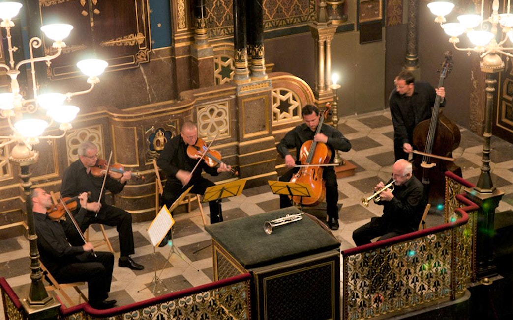 Musicians performing at a classical concert in the Spanish Synagogue.