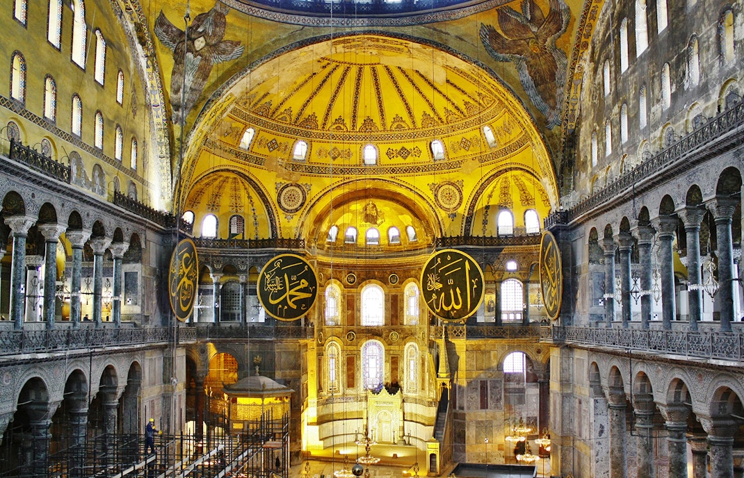 Hagia Sophia interior with private guide explaining historical mosaics, Istanbul, Turkey.