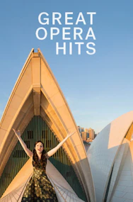 Opera singers performing on stage at an Opera Greatest Hits concert in a grand theater.