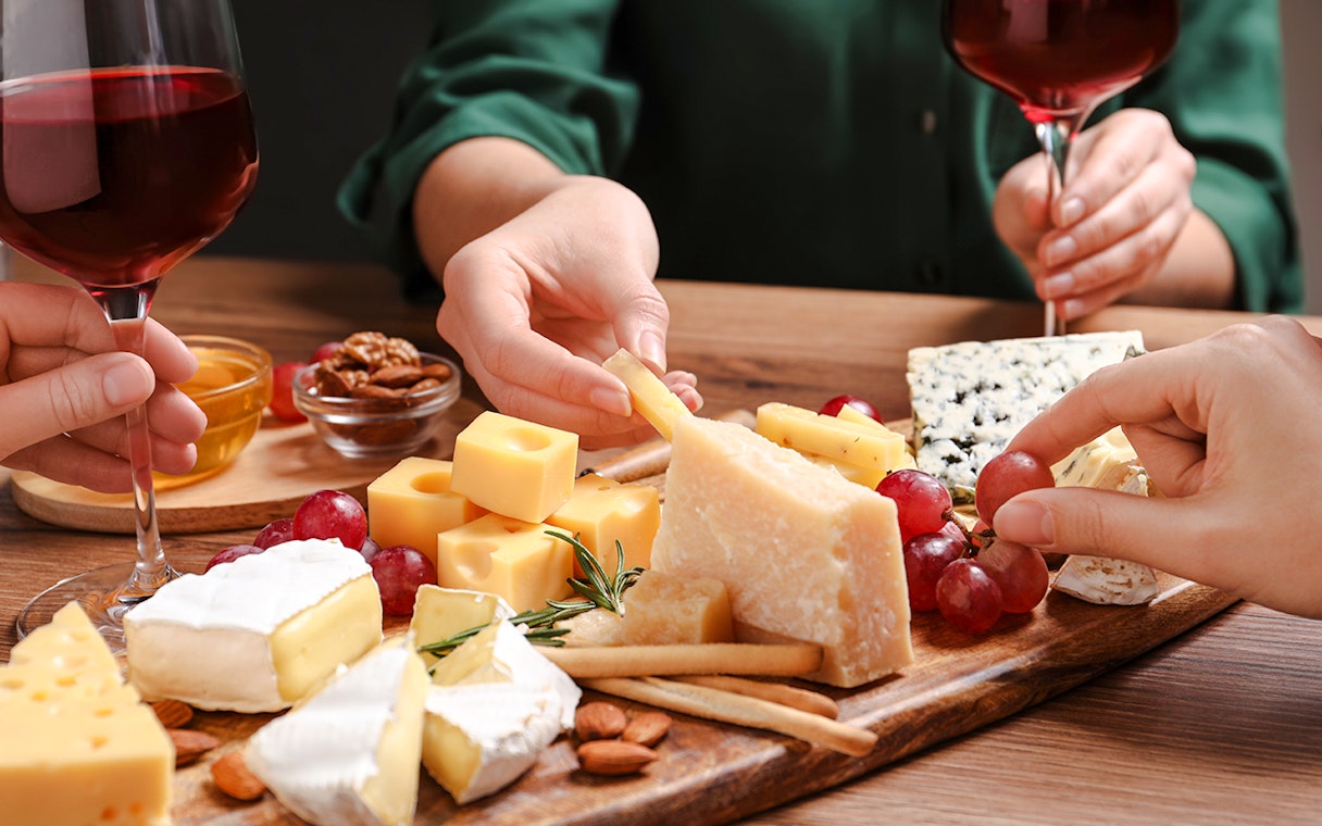 Cheese and wine tasting at the Cheese Museum in Paris, France.