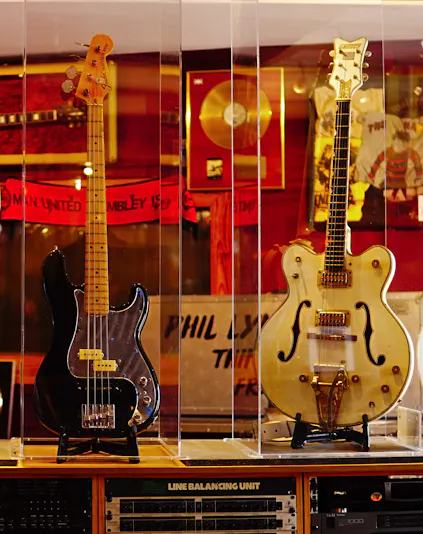 Three iconic guitars displayed at the Irish Rock N Roll Museum Experience in Dublin.