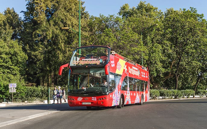 City Sightseeing Hop on Hop off tour bus in Benalmadena on a sunny day.