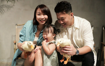 Family enjoying time with ducks at Just Farm Indoor Zoo Kuala Lumpur.