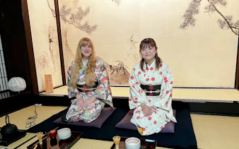 Women in kimonos seated in a traditional teahouse during the Tokyo National Museum Matcha Tour.