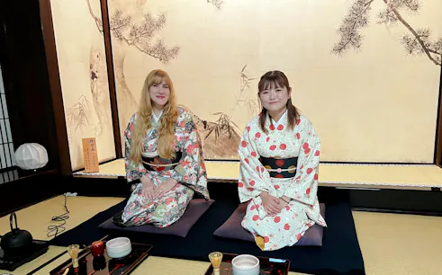 Women in kimonos seated in a traditional teahouse during the Tokyo National Museum Matcha Tour.