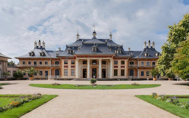 Pillnitz Castle exterior with gardens, part of Saxon Switzerland half-day tour.