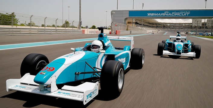Race cars on Yas Marina Circuit track during FORMULA YAS 3000 Driving Experience, Dubai.