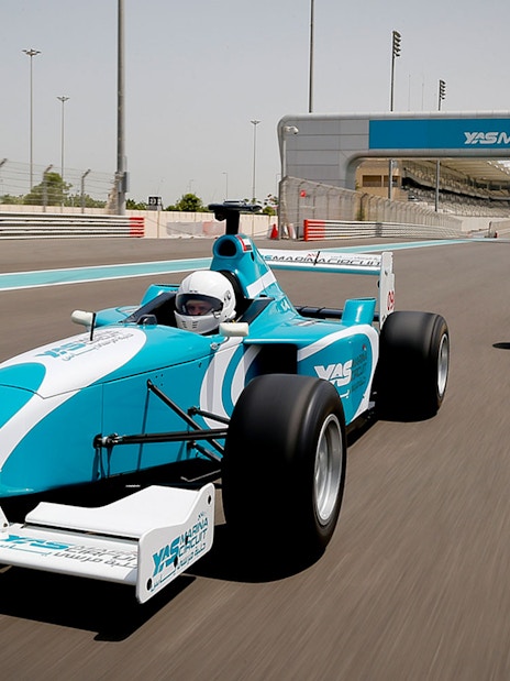 Race cars on Yas Marina Circuit track during FORMULA YAS 3000 Driving Experience, Dubai.