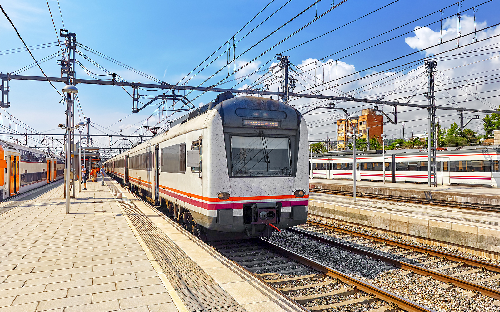 Barcelona metro entrance with travelers using the Barcelona Travel Card.