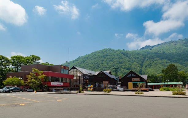 Mt. Usu cable car station with green hills in the background, Japan.