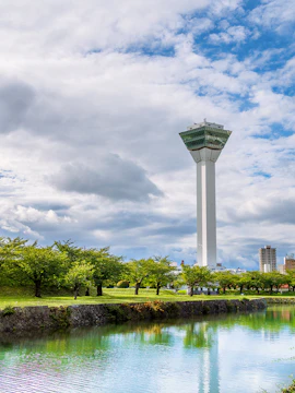 Goryokaku Tower overlooking park and moat in Hakodate, Japan.