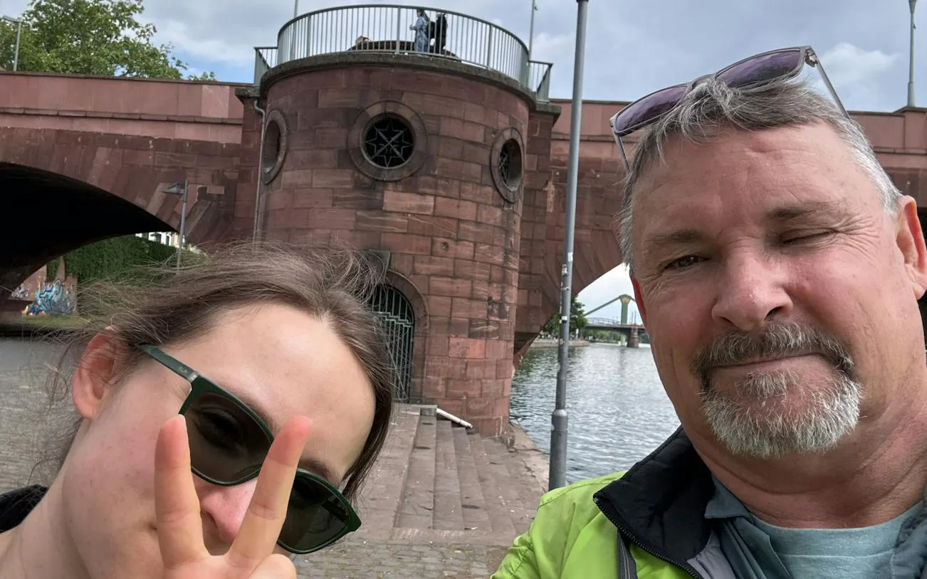 Selfie near the Old Bridge in Frankfurt during a self-guided city exploration game.